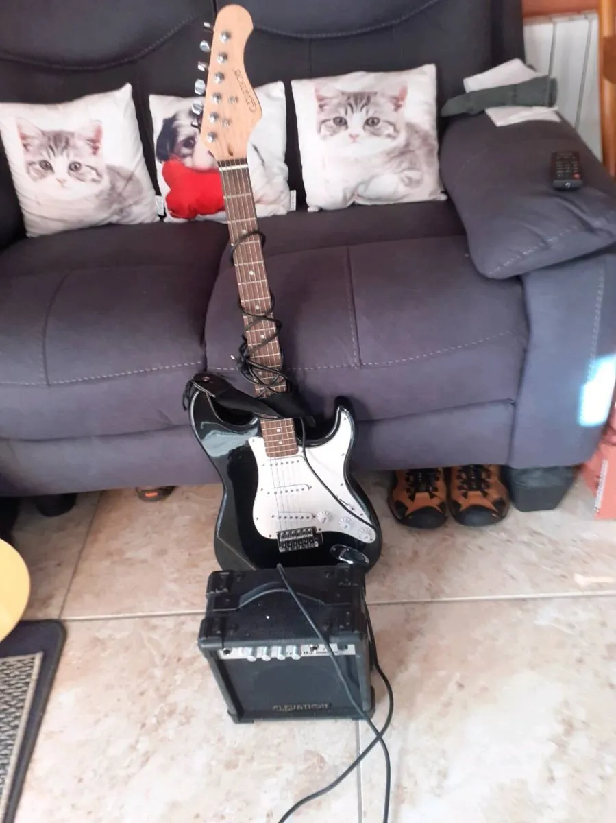 2 Guitars + 1 Amplifier - Image 2