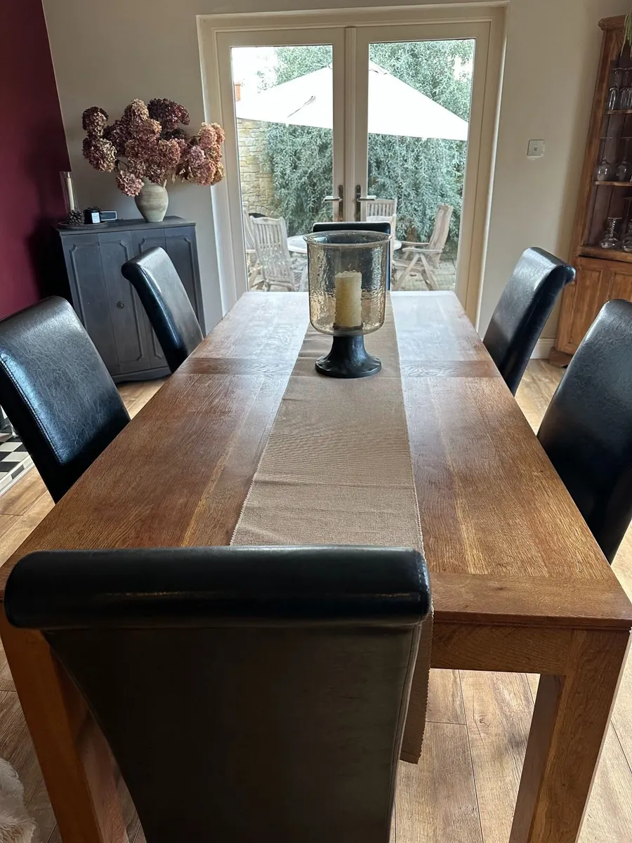6 ft solid oak dining table and chairs for sale - Image 1