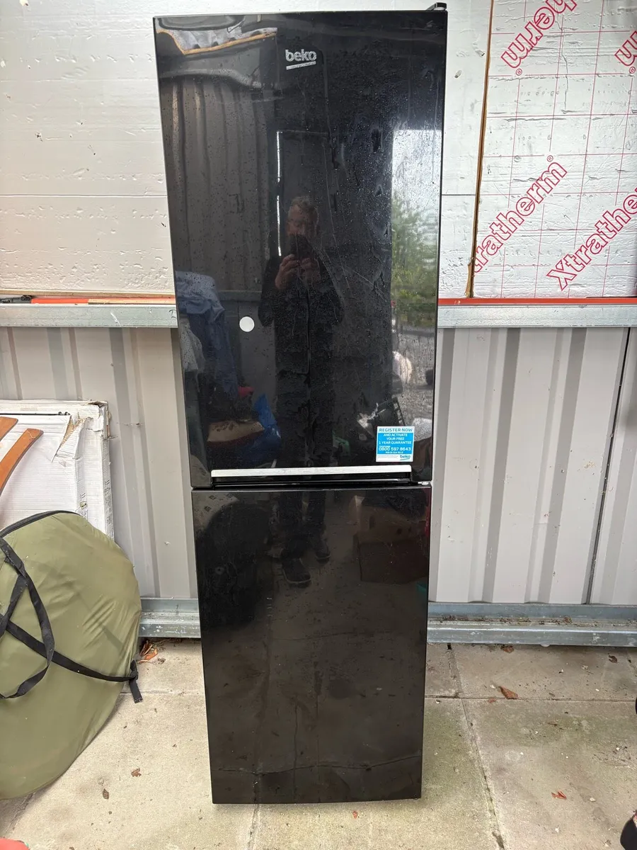 Beko fridge freezer and plug in room heater - Image 1