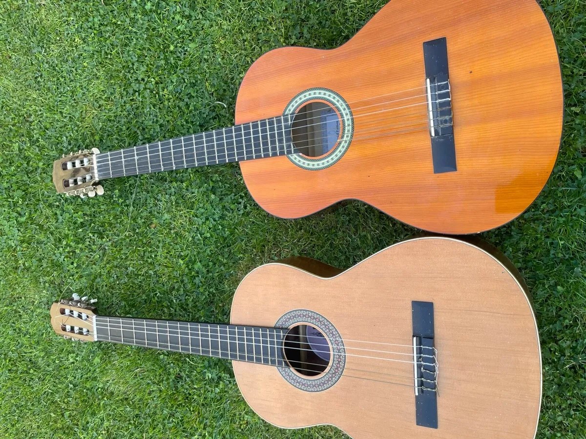 2X acoustic guitars - Image 1