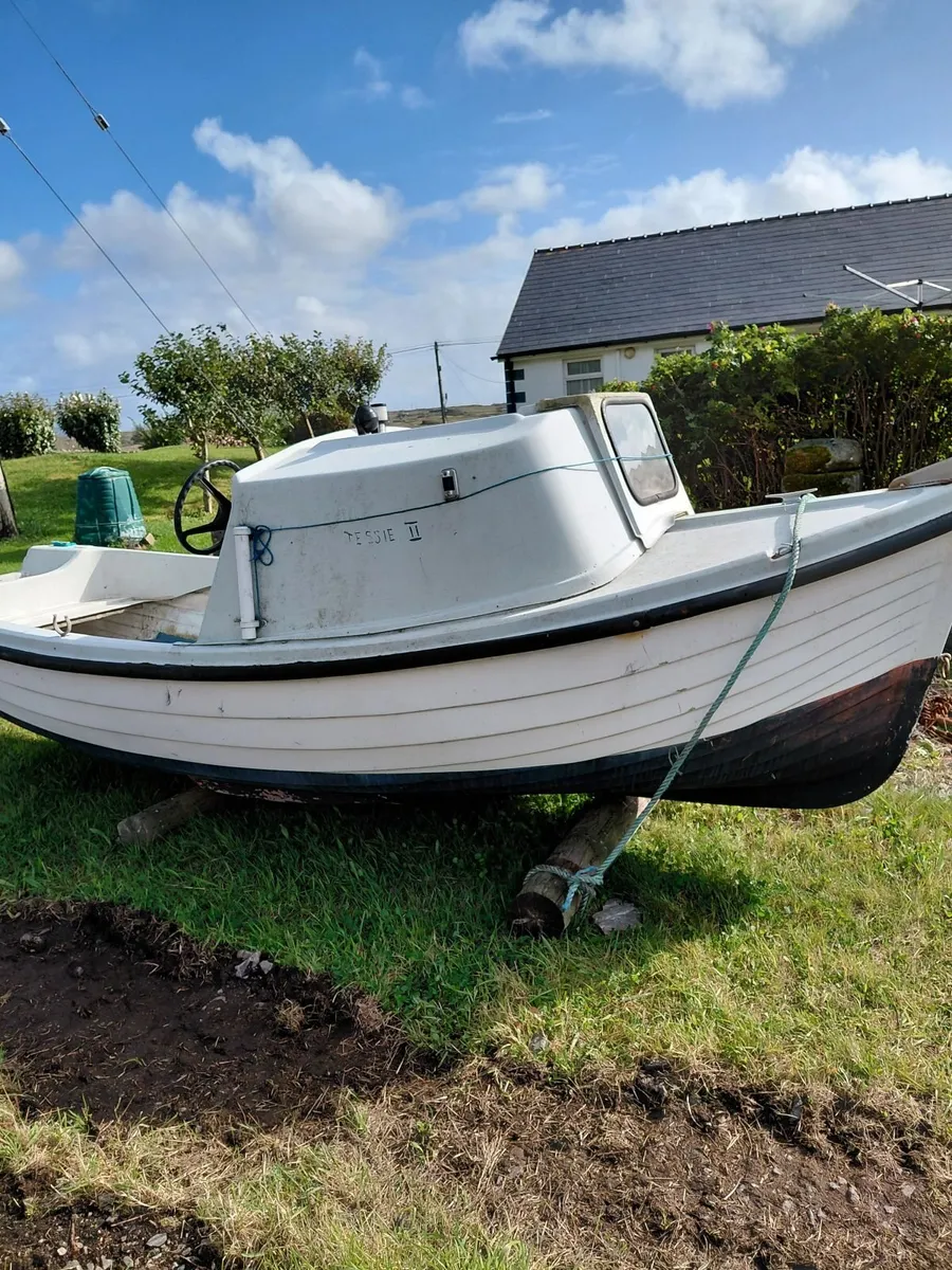 Boat with Engine - Image 1