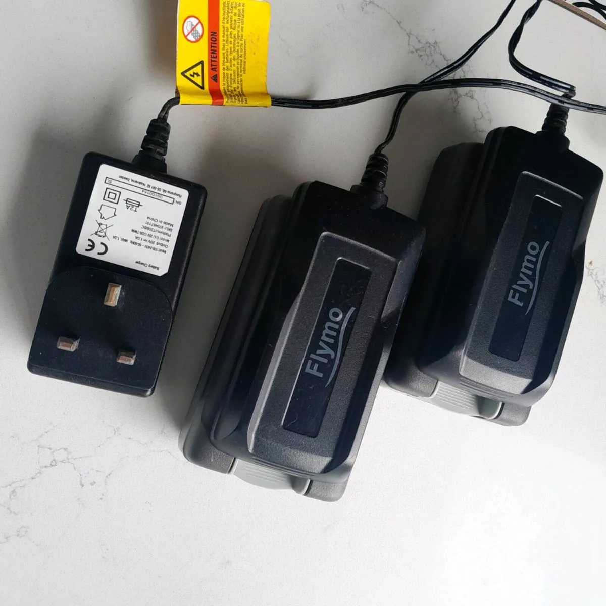 Flymo battery 20v and charger - Image 3