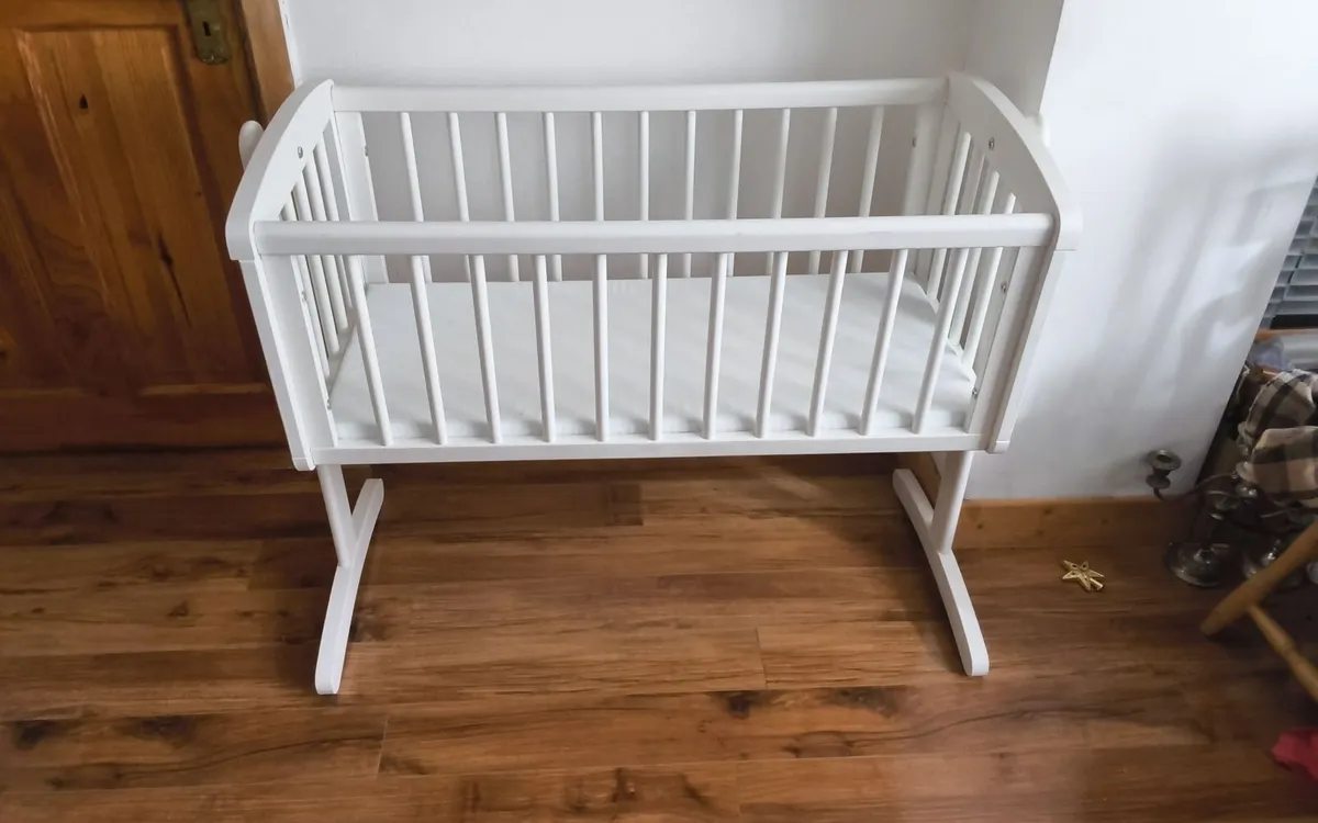 As new rocking cot brand new mattress - Image 1
