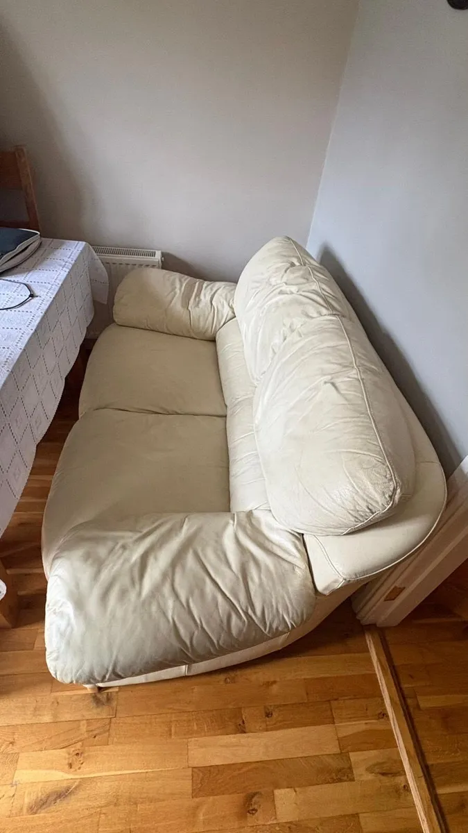 Two seater cream leather sofa - Image 1