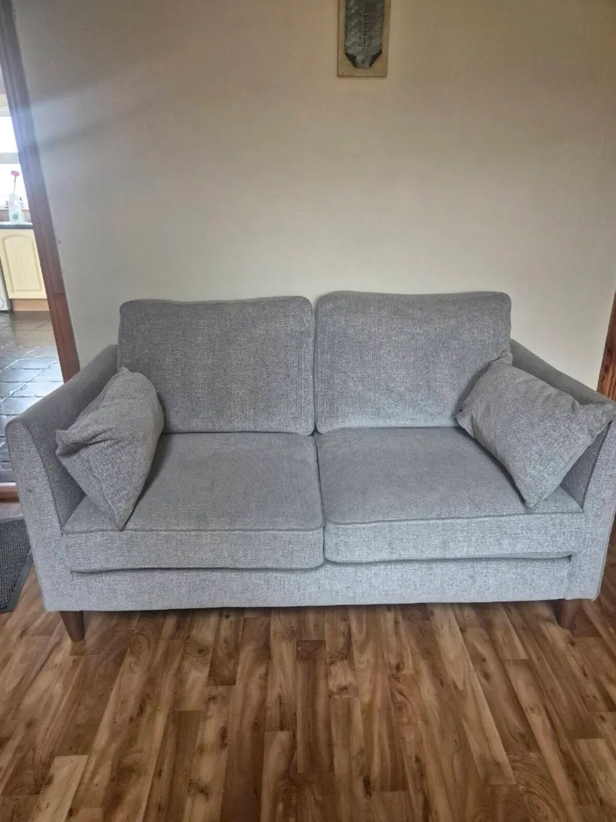 Grey 2 seater couch and 2 arm chairs. - Image 1