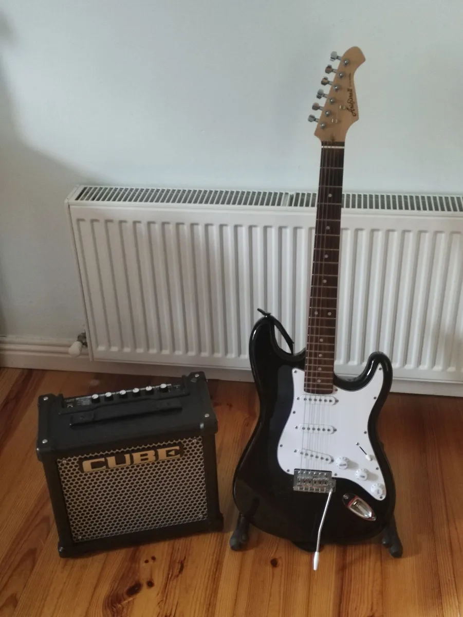 Electric Guitar & Roland Amplifier - Image 1