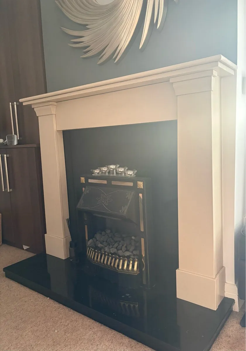 Stone Cream and black fireplace - Image 1