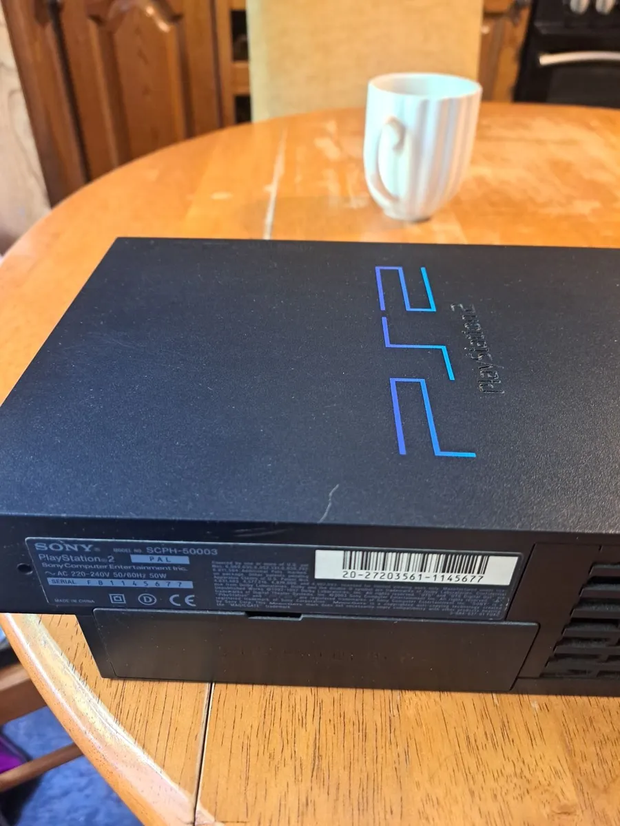PS2 with controller,remote,cables and 2 games - Image 2