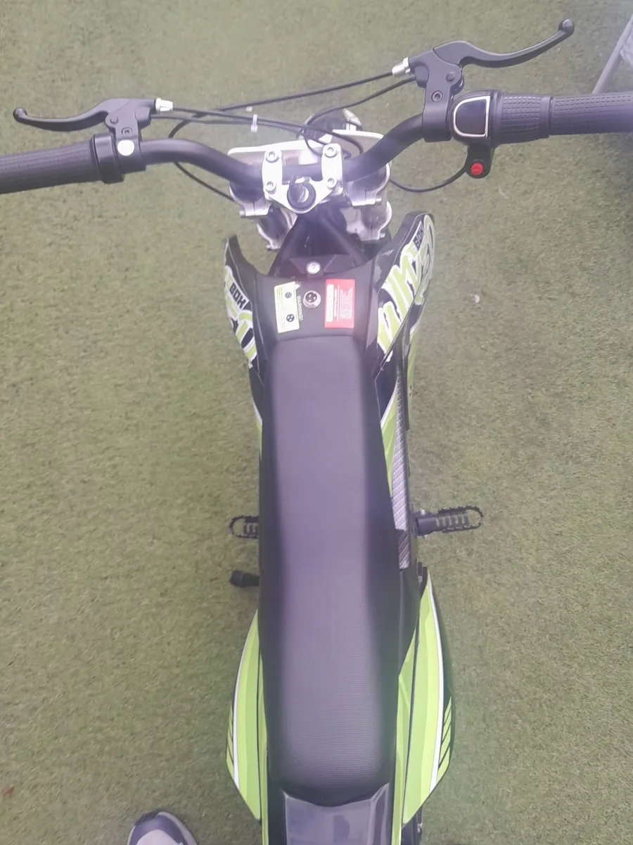 Kids electric dirt bike and Helmet - Image 3