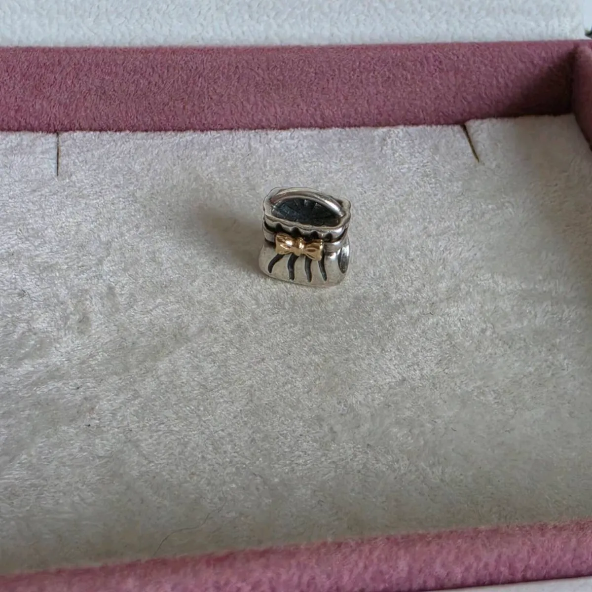 Pandora "Bow Purse" charm crafted from sterling - Image 1