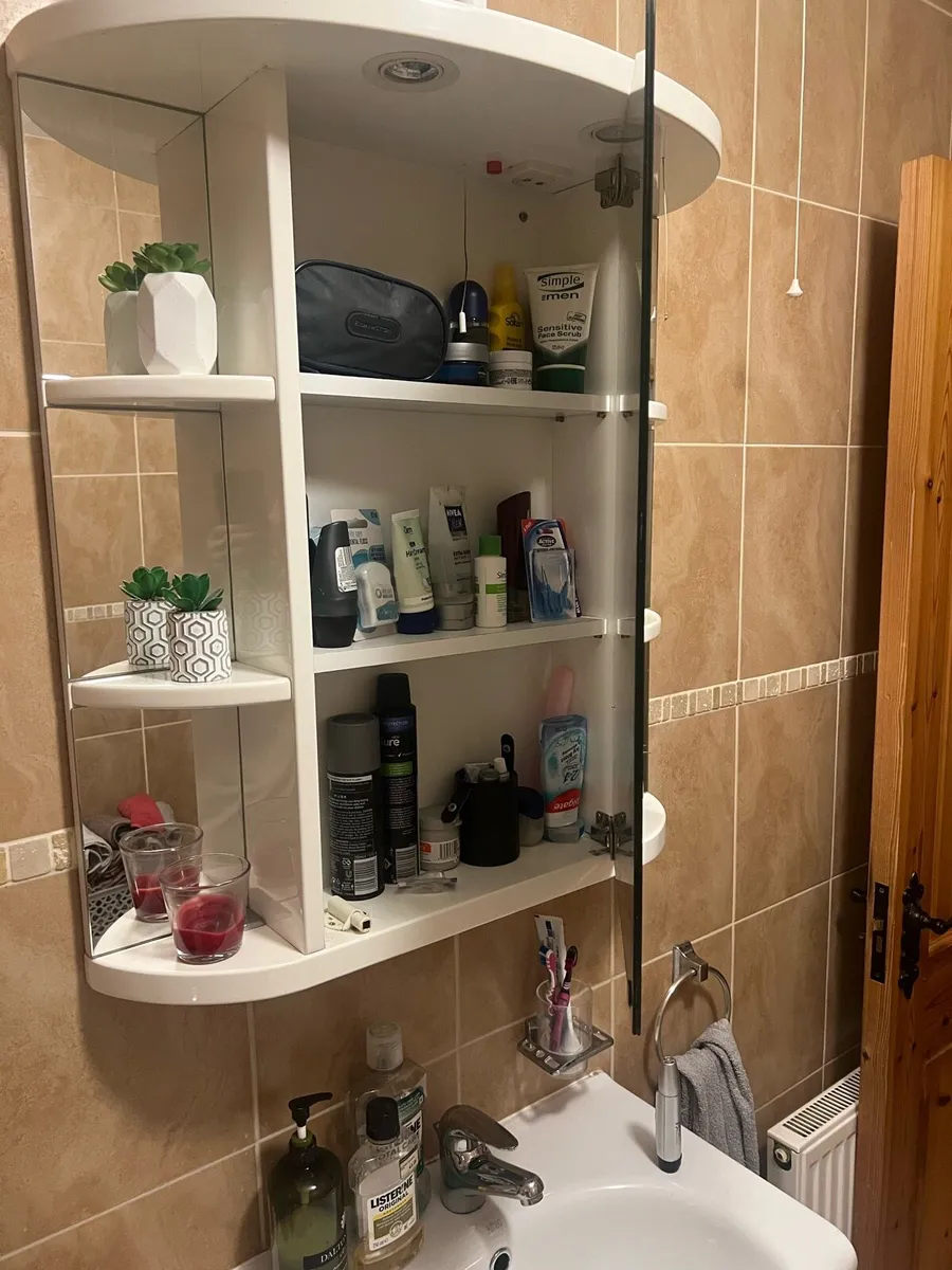 Bathroom mirror with shelving behind - Image 2