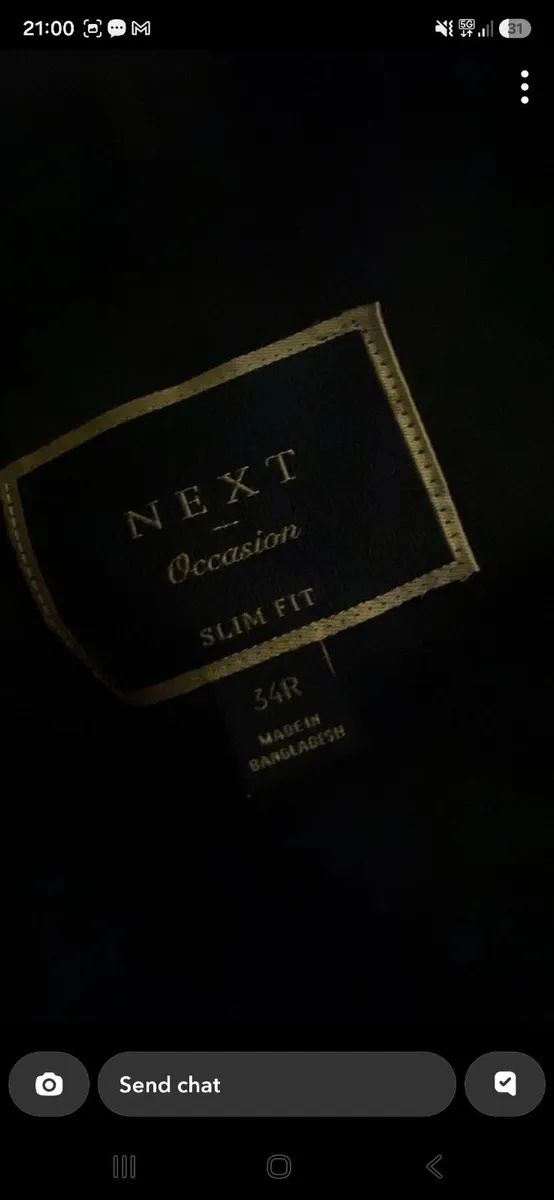 Black suit worn for few hours at funeral - Image 2