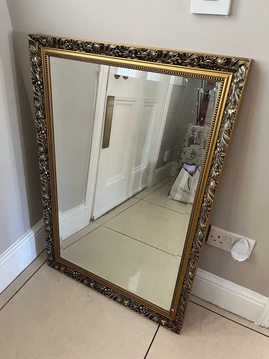 Gold framed mirror