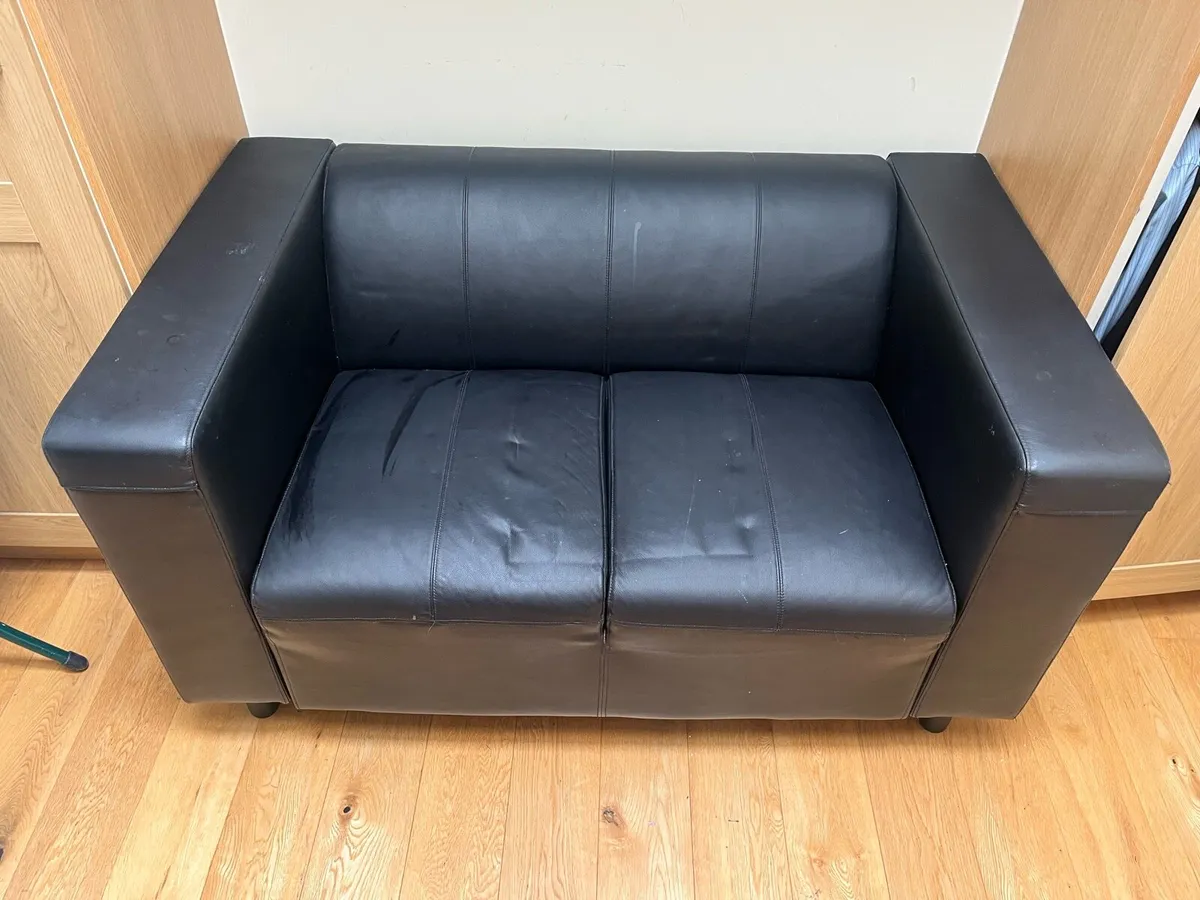 Free two-seater leather couch - Image 1