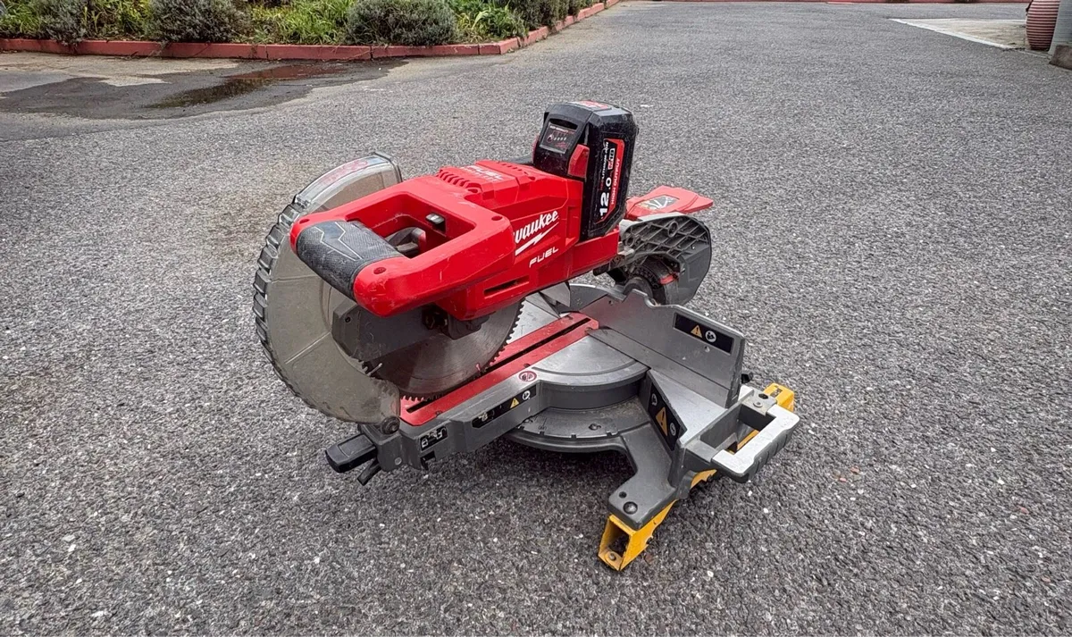 Milwaukee M18 sliding mitre saw + 12 amp battery - Image 1