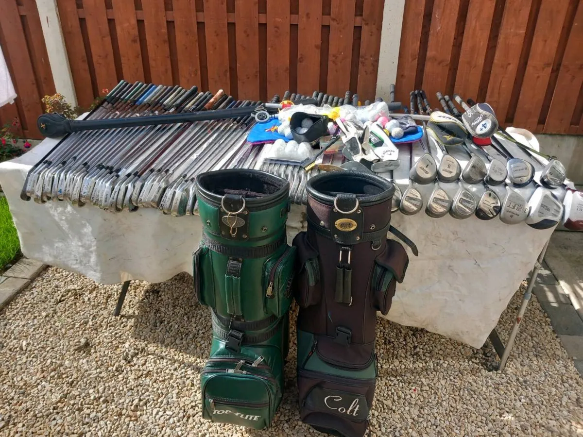 A selection of golf clubs and bags and golf balls - Image 1