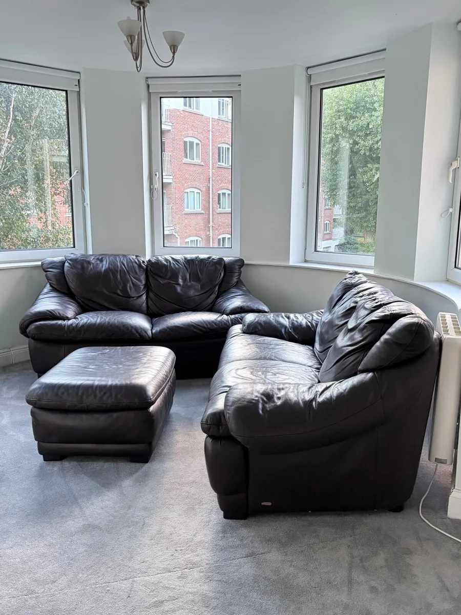 Two leather couches and POUFFE. Free. - Image 4