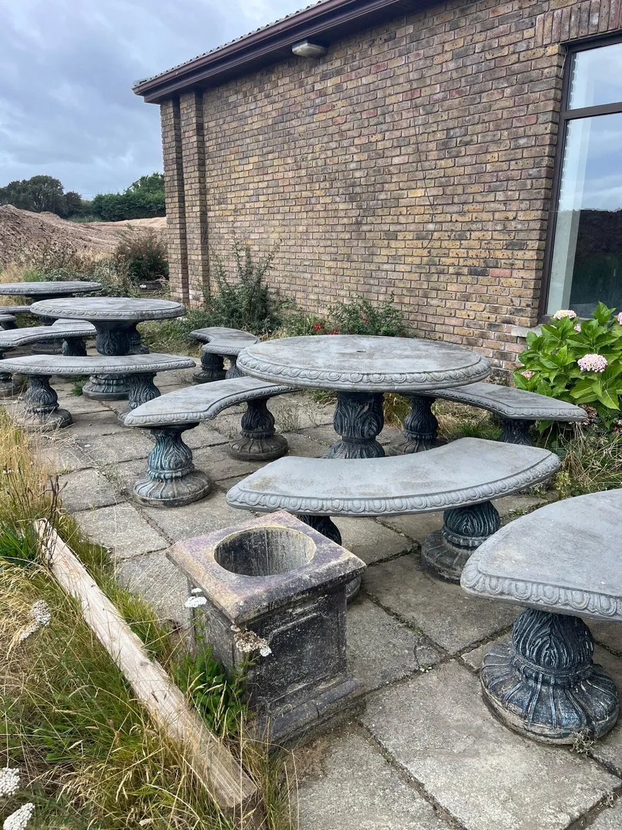 Classic stone table with three curved benches. - Image 2