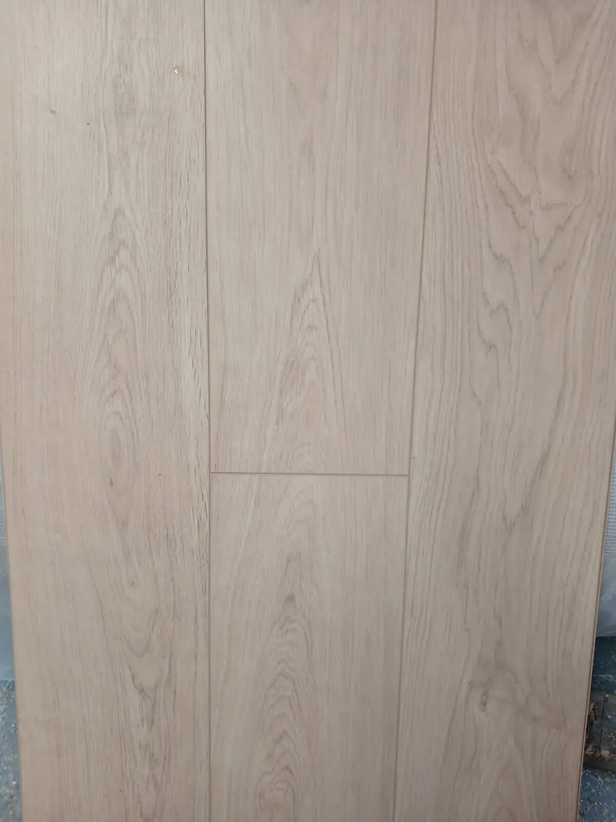 7mm Malaga Lam flooring + installation available - Image 1
