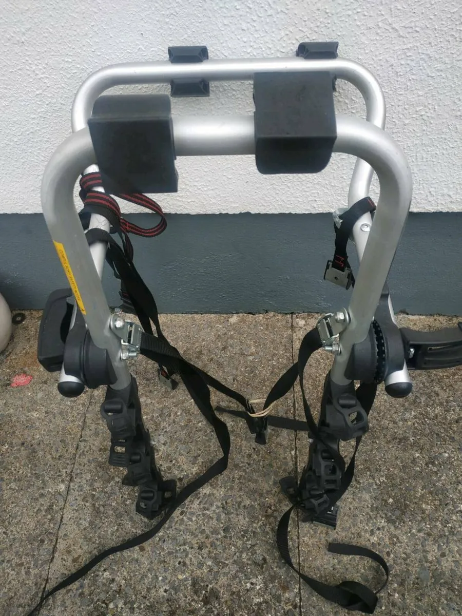Triple bike rack fits most cars. - Image 2