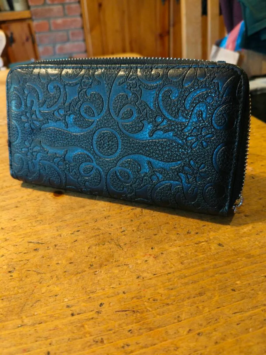 black Dewest zipper wallet featuring an embossed f - Image 2