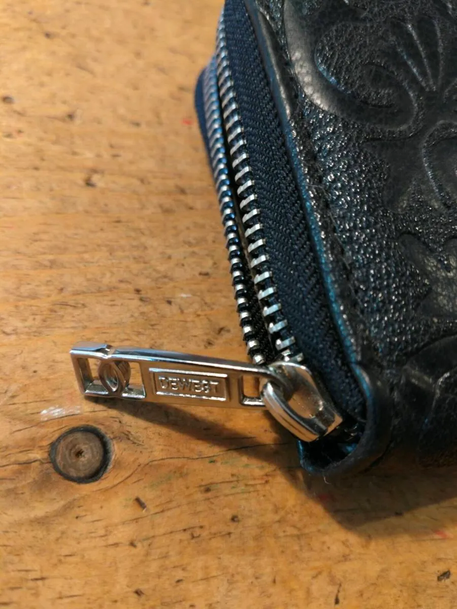 black Dewest zipper wallet featuring an embossed f - Image 4