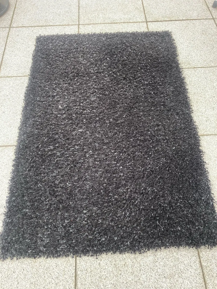 2 Black Shaggy Rugs - Image 1