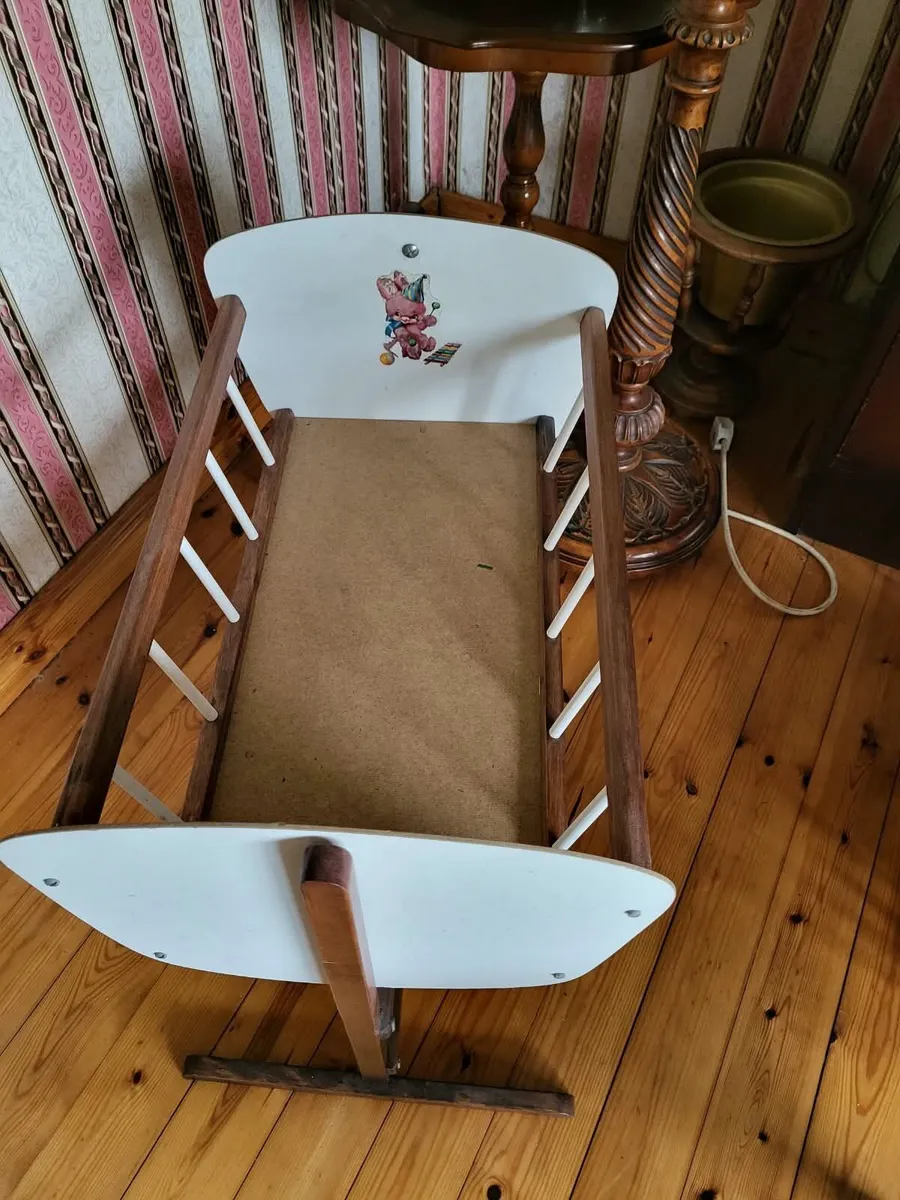 Doll's rocking cradle