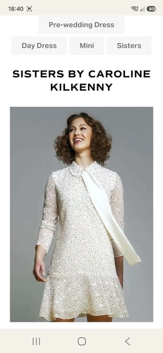 Sisters by Caroline Kilkenny  Cream & Teal Heart Print Dress - Image 1