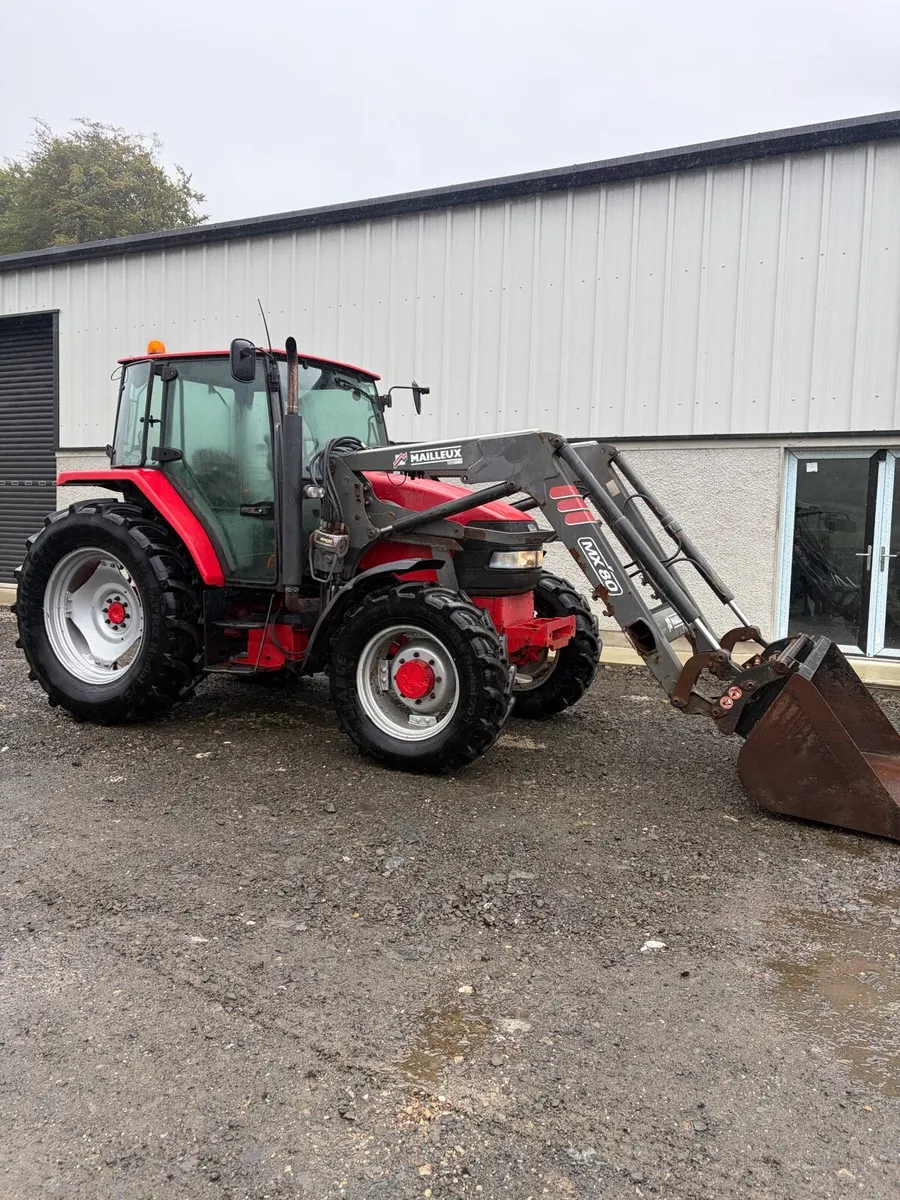 2004 McCormick cx95 & loader - Image 1