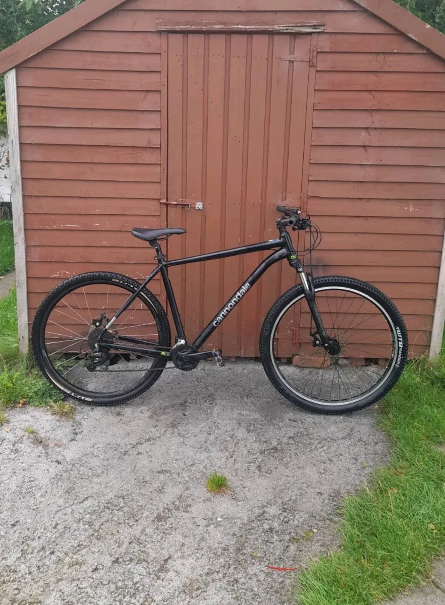 Black cannondale trail mountain bike for sale - Image 1