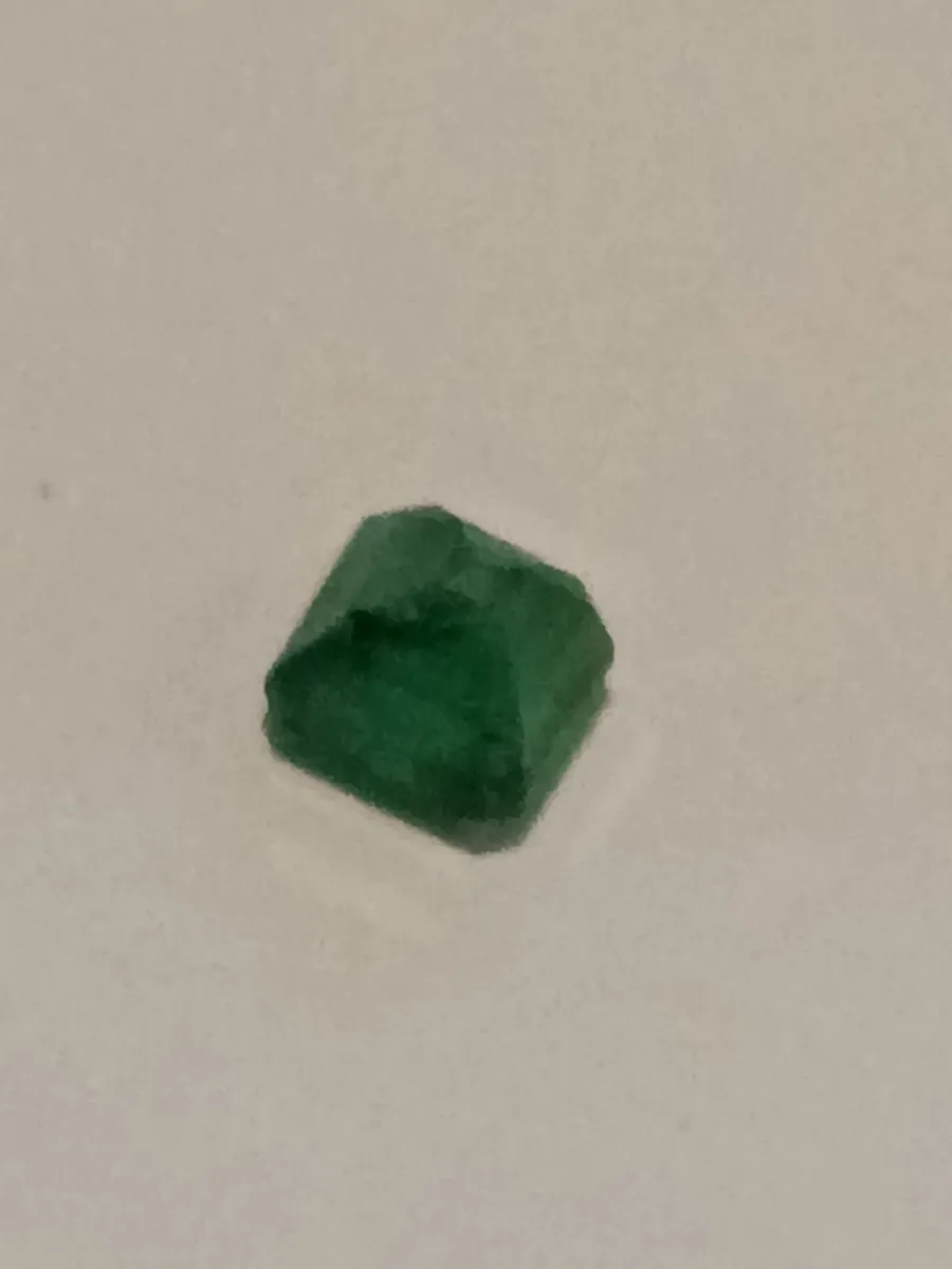 Warm green emerald gem