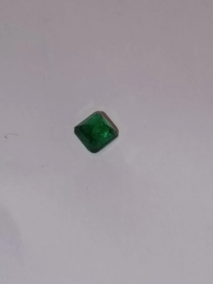 Warm green emerald gem