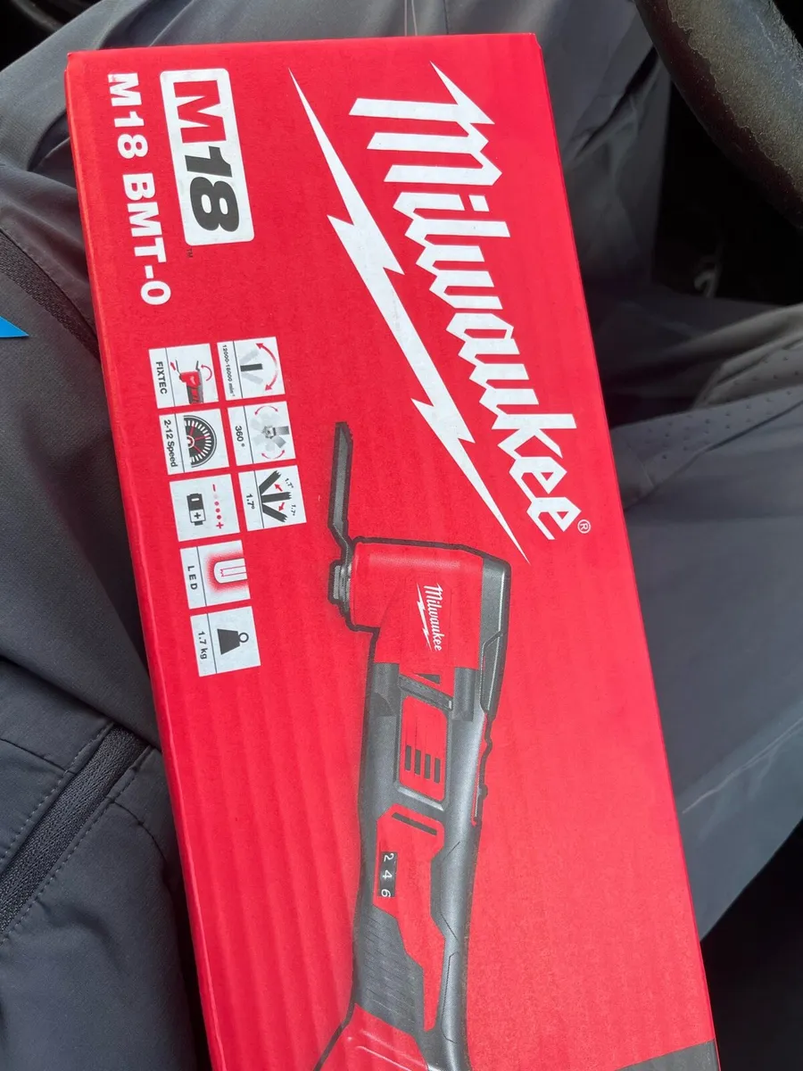 Milwaukee multitool and battery - Image 1