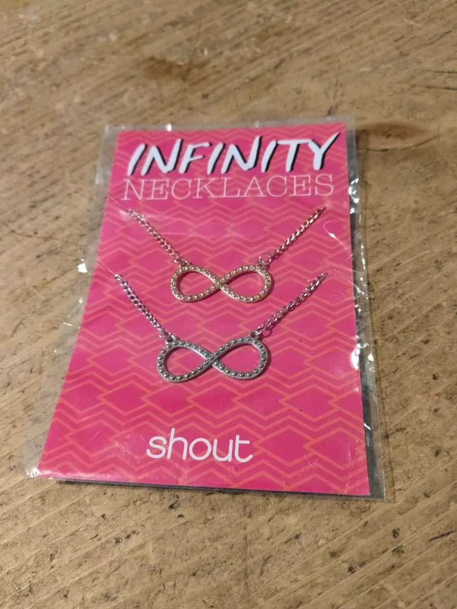 infinity symbol necklaces feature a delicate chain - Image 1