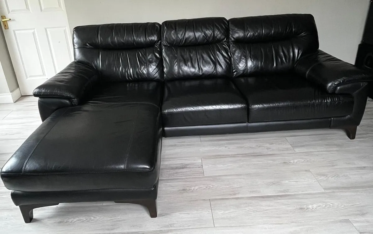 Black L shaped Leather Couch - Image 1