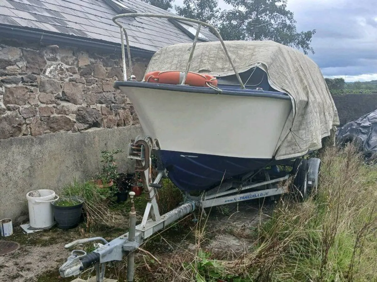 Boat trailer with unfinished project - Image 1