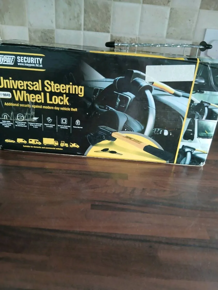 UNIVERSAL STEERING WHEEL LOCK NEW BOXED - Image 3