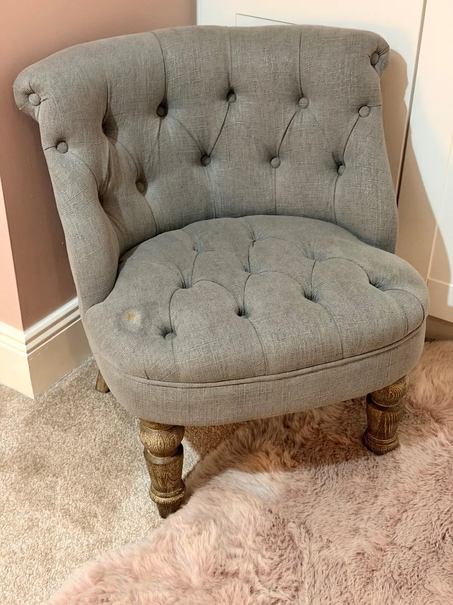 Grey padded chair for a bedroom - Image 1