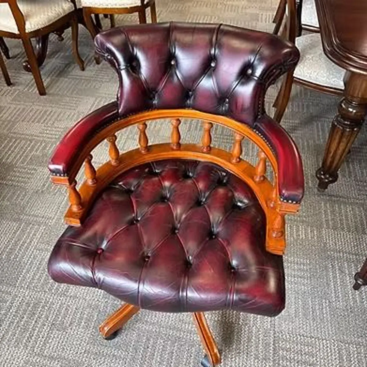 Preowned Chesterfield button back swivel oxblood c