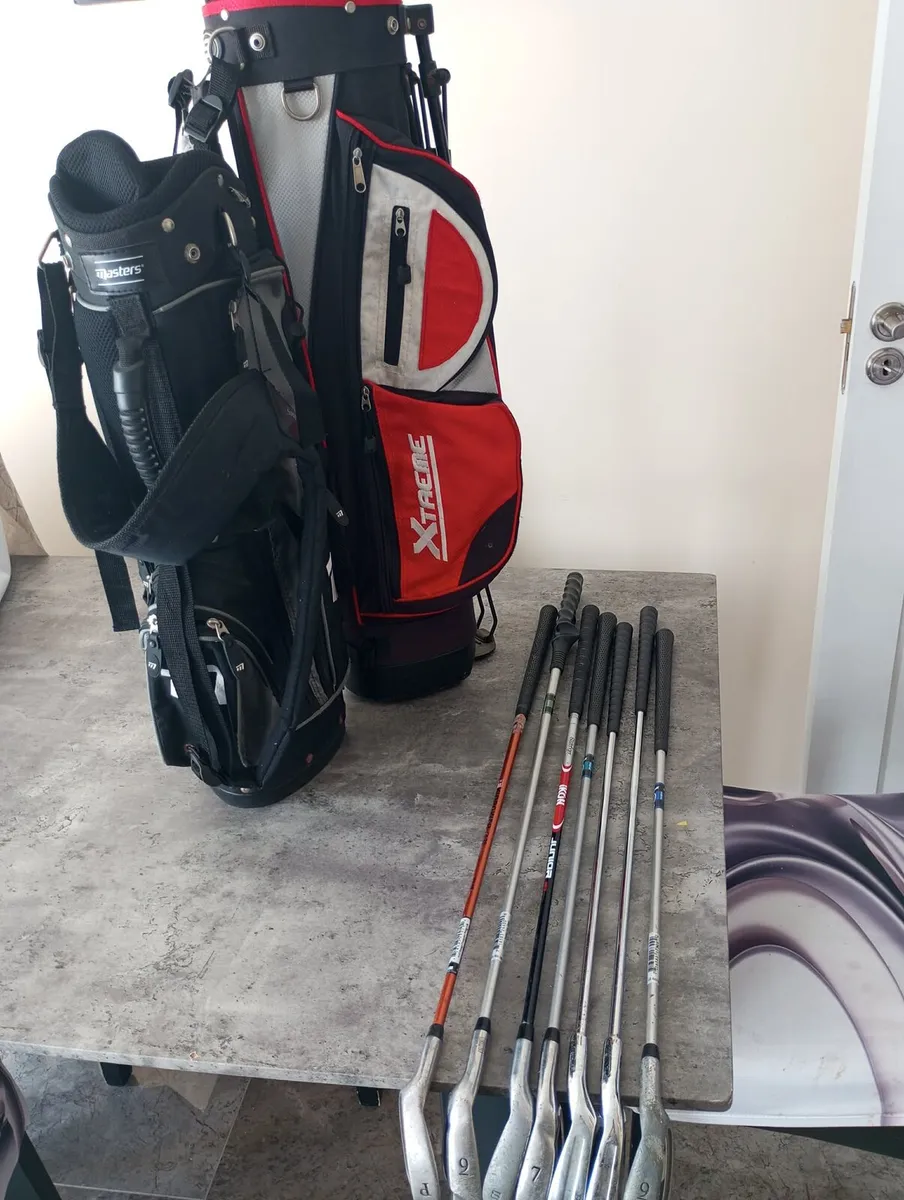 Kids golf clubs and bags. - Image 1