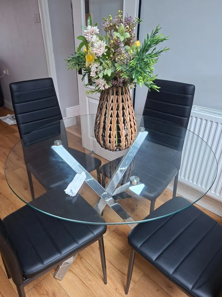Round glass dining table and chairs
