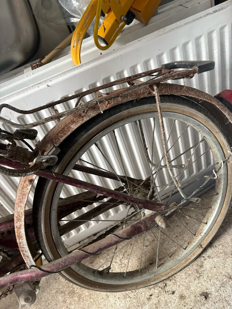 Vintage air pump and bicycle - Image 2