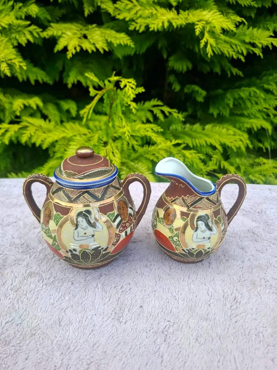 Pair of asian sugar milk jug postage possible