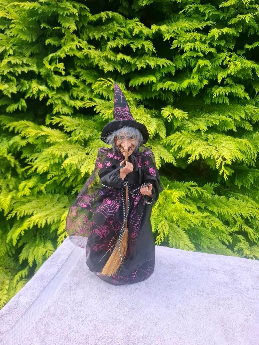 Standing witch halloween decor