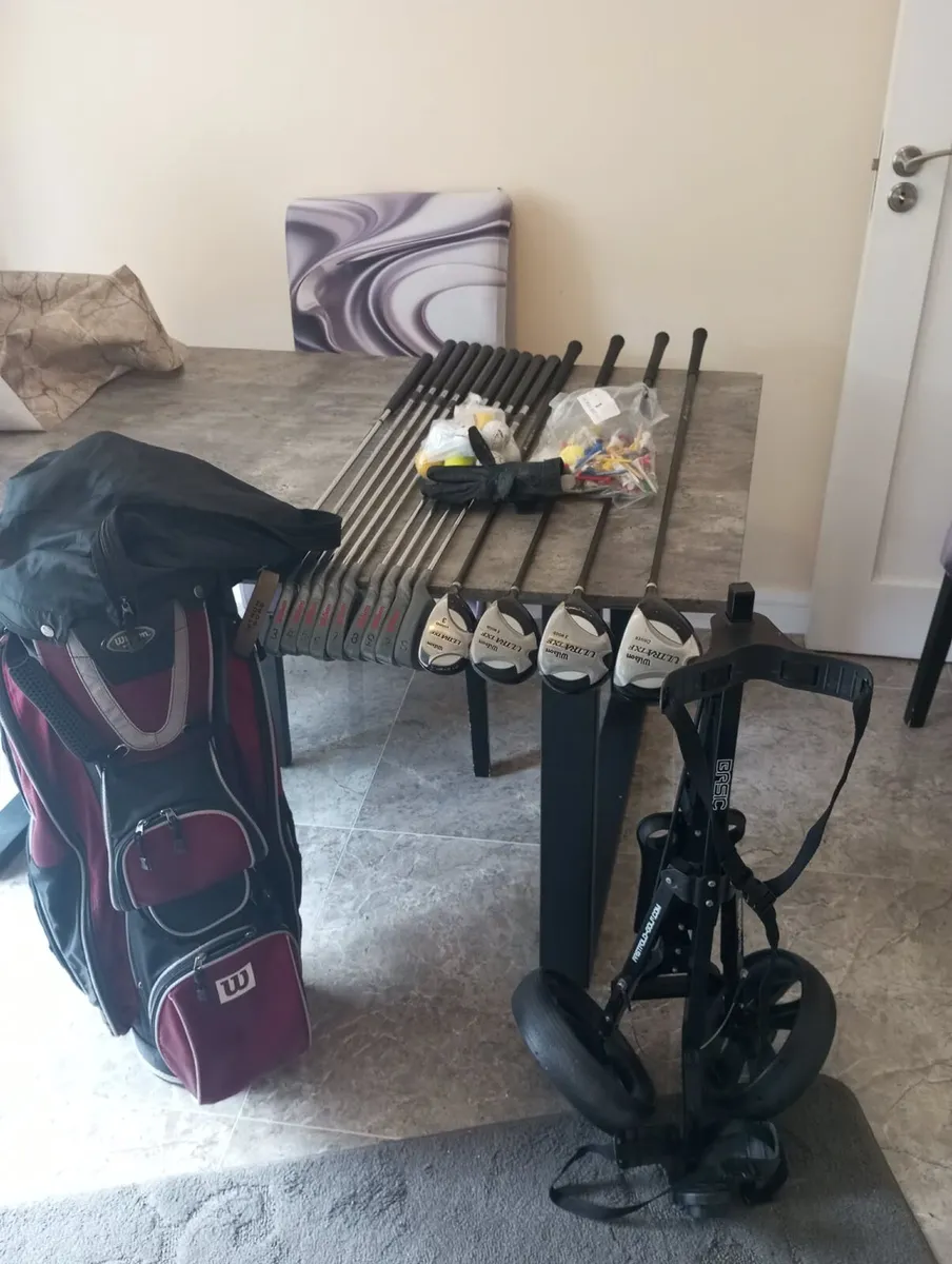 Wilson golf clubs and bag. And trolley. - Image 1