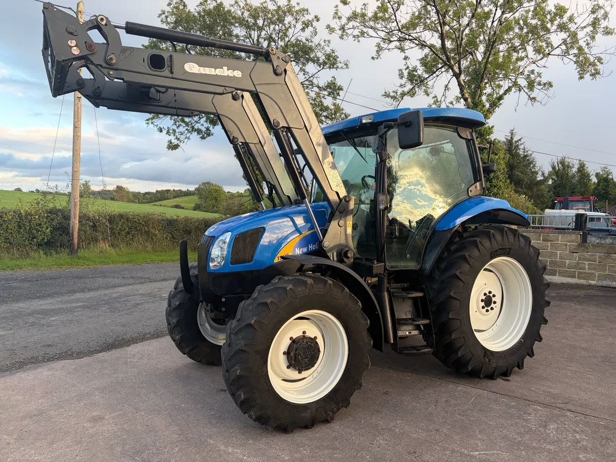 New Holland TS110A + loader - Image 1