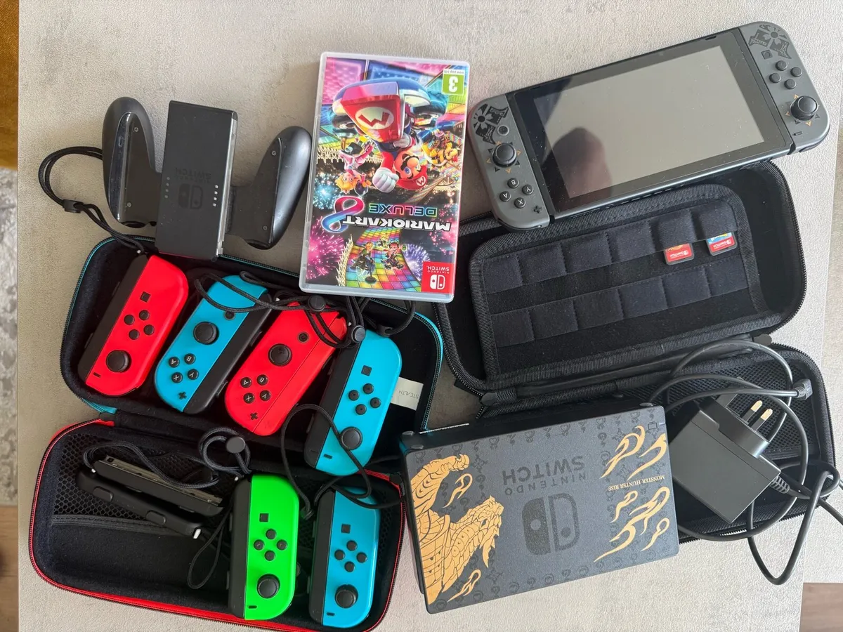 Nintendo switch + 3 games + 6 extra controllers