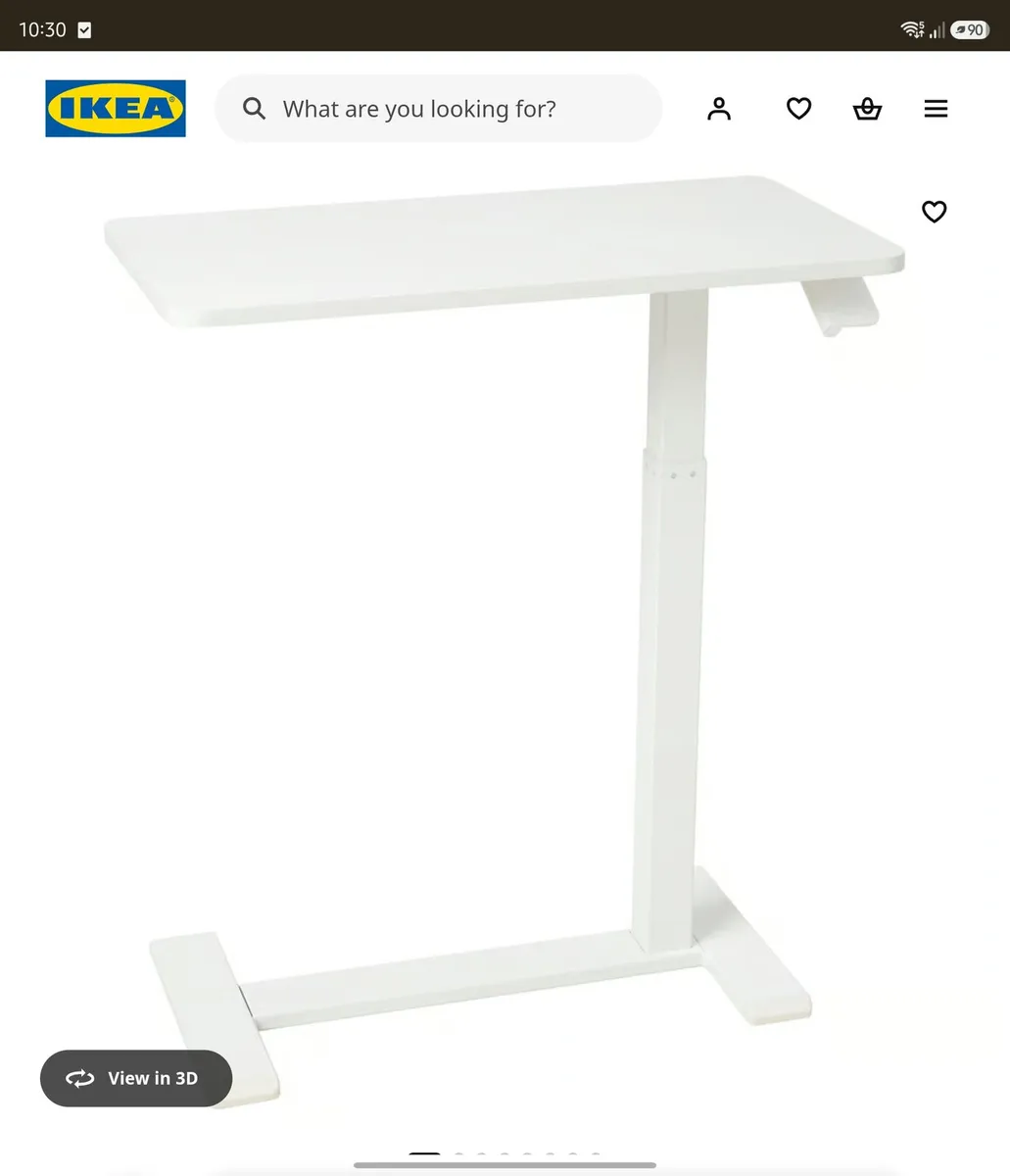 Ikea table over the couch on wheels