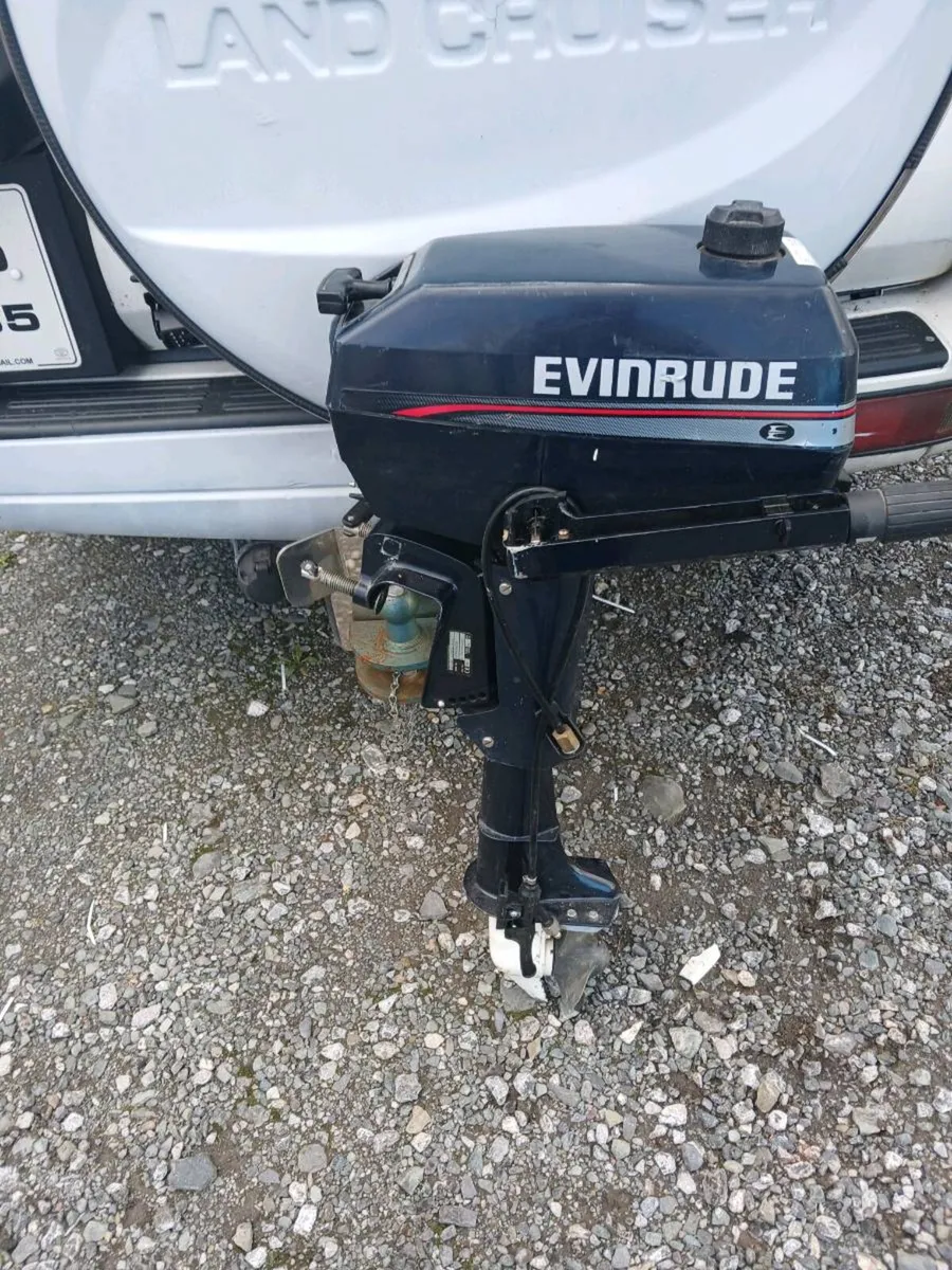 Small fiberglass boat and outbound - Image 1